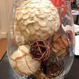 Glass vase with ball fillers